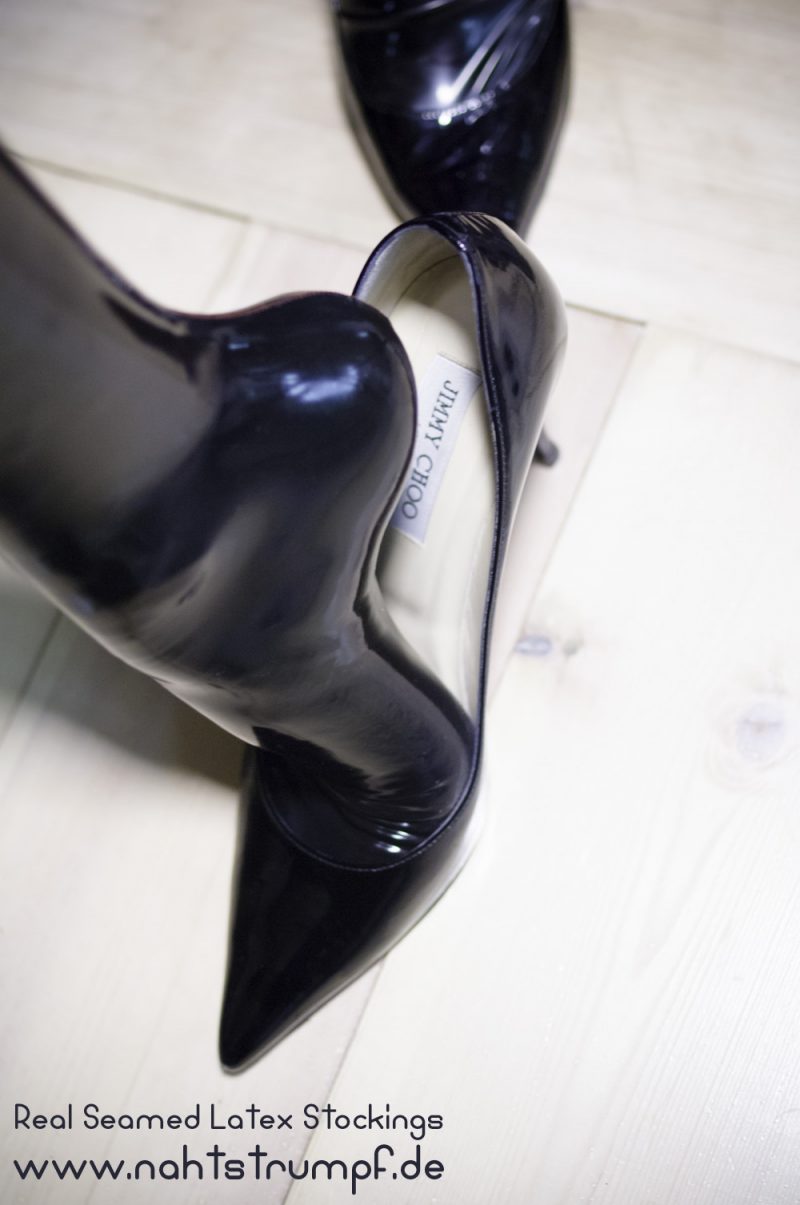 Feet in latex stockings