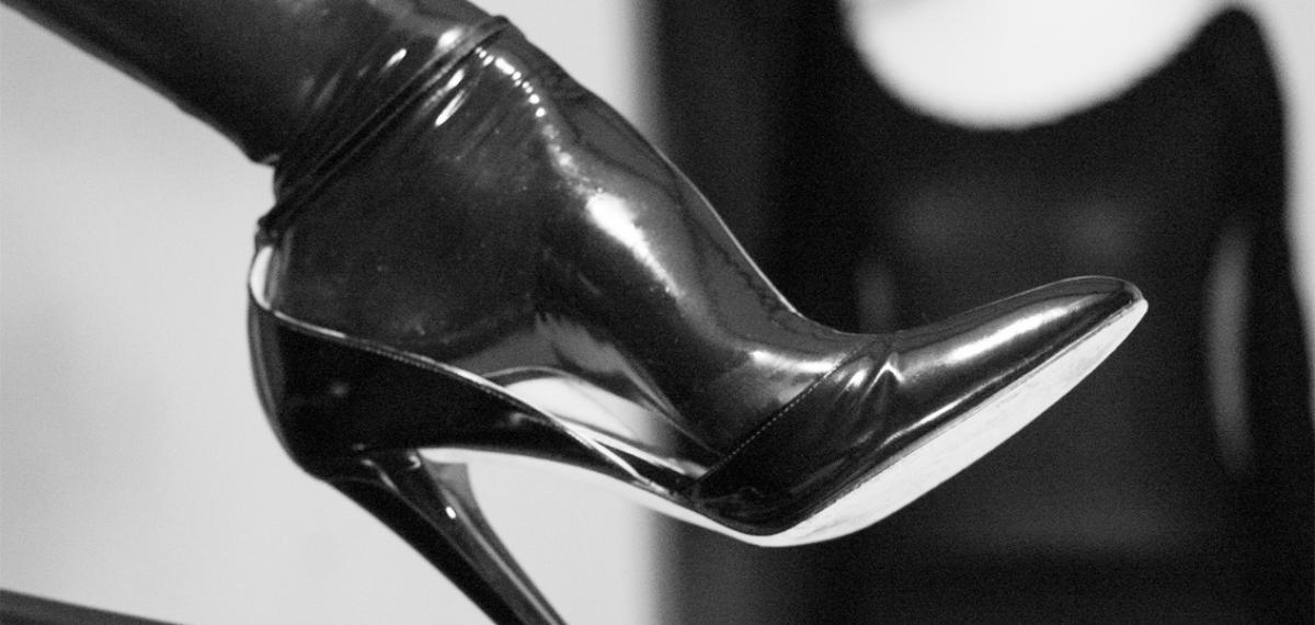 Latex stockinged feet in black high heels