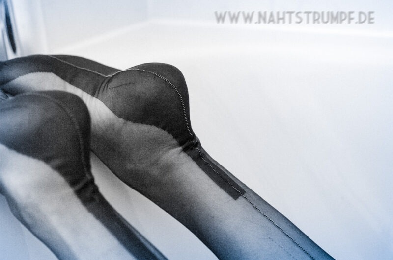 Red stocking seams at womens legs