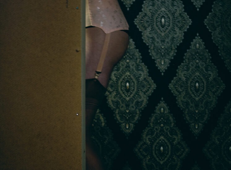 Foto women i a vintage girdle. Only a part of her body is showing